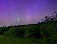 Meteor durring an aurora