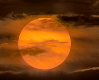Daytime sun in clouds